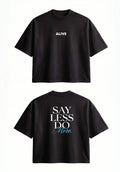 Black t-shirt with 'ALIVE' on the front and 'SAY LESS DO MORE' on the back.
